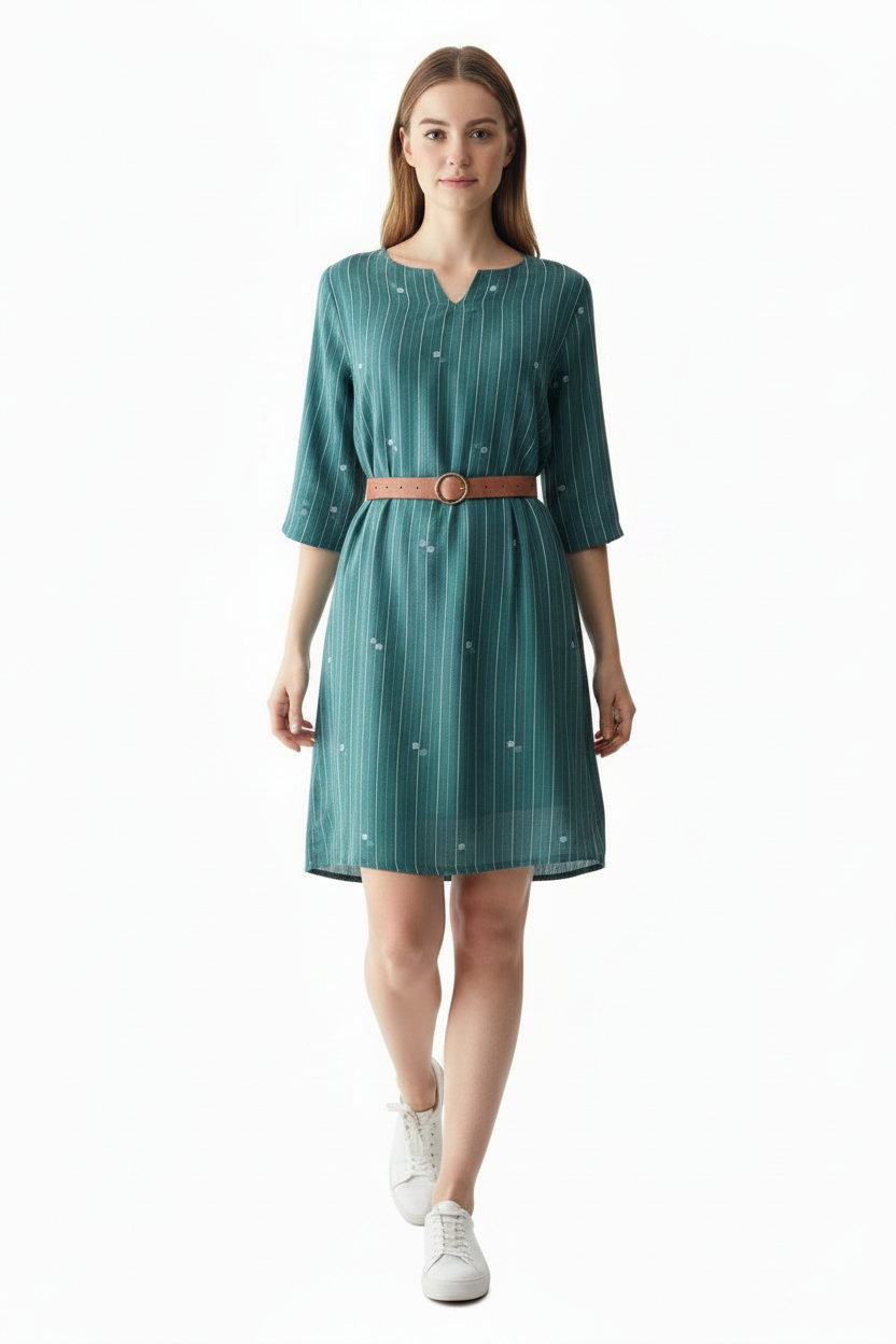 Teal dress with a tan belt on a woman