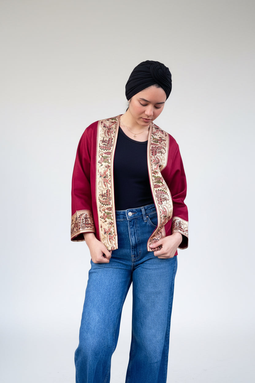 Person wearing a red silk jacket one of a kind