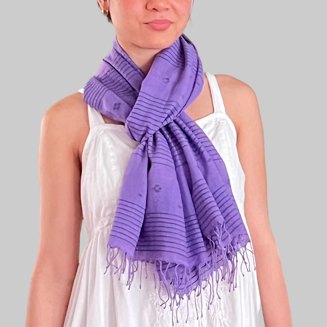 Woman wearing a purple lilac scarf with purple jamdani motifs