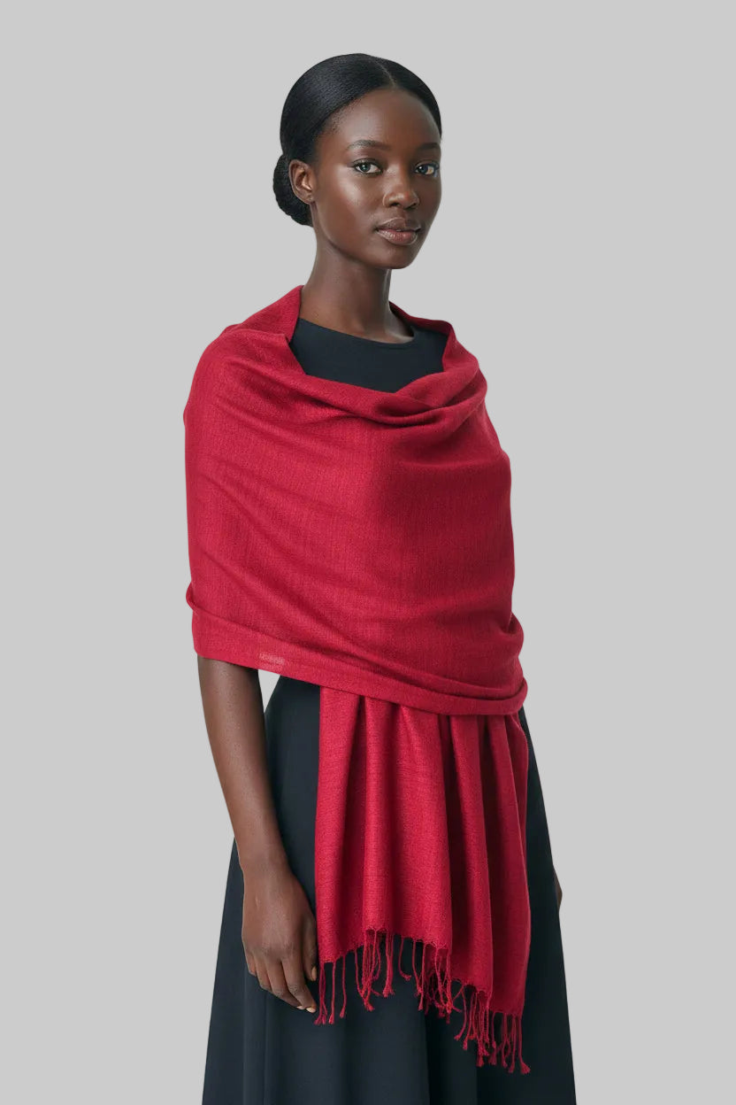 Red luxurious vegan silk scarf used as a wrap 